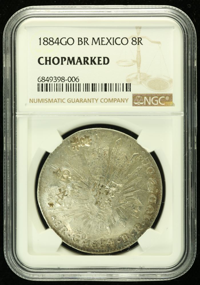 Chopmarked 8 Reales 1884 Go BR NGC CHOPMARKED 0136561Chopmarked 8 Reales 1884 Go BR NGC CHOPMARKED 0136561